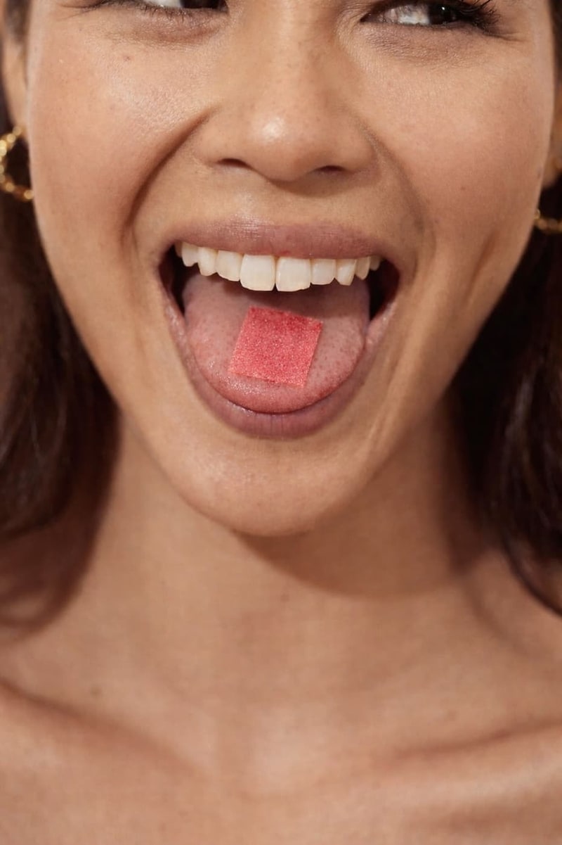 Buccal peptide strip in use